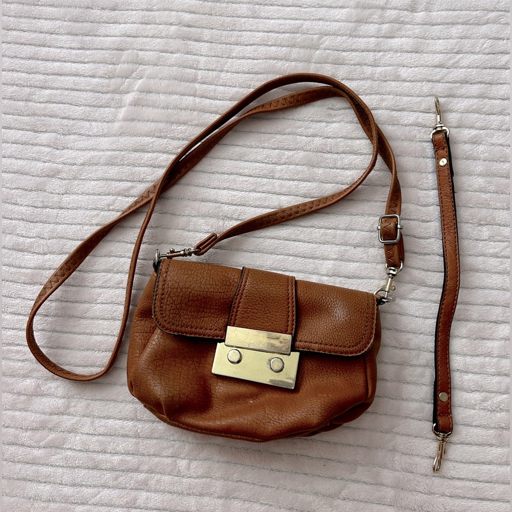 Small brown purse with gold clasp
